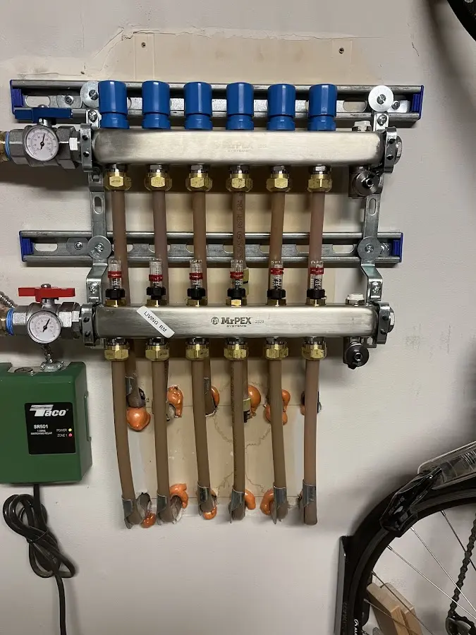 Plumber performing Water Heater Repair at a residential property in Brecknock